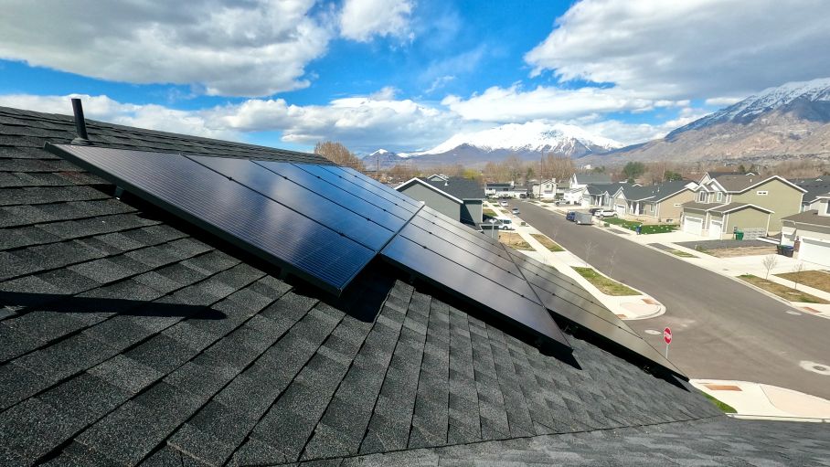 Solar panels on a shingle roof in nh