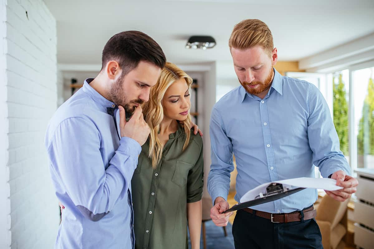 Picture of a representative consulting with a homeowner