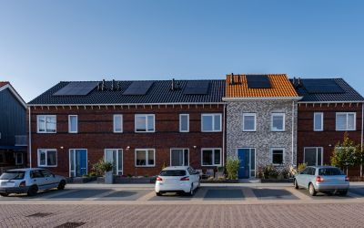 This is an image of newly built houses with Solar panels installed on their roofs.